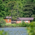 view of cabins across lake
